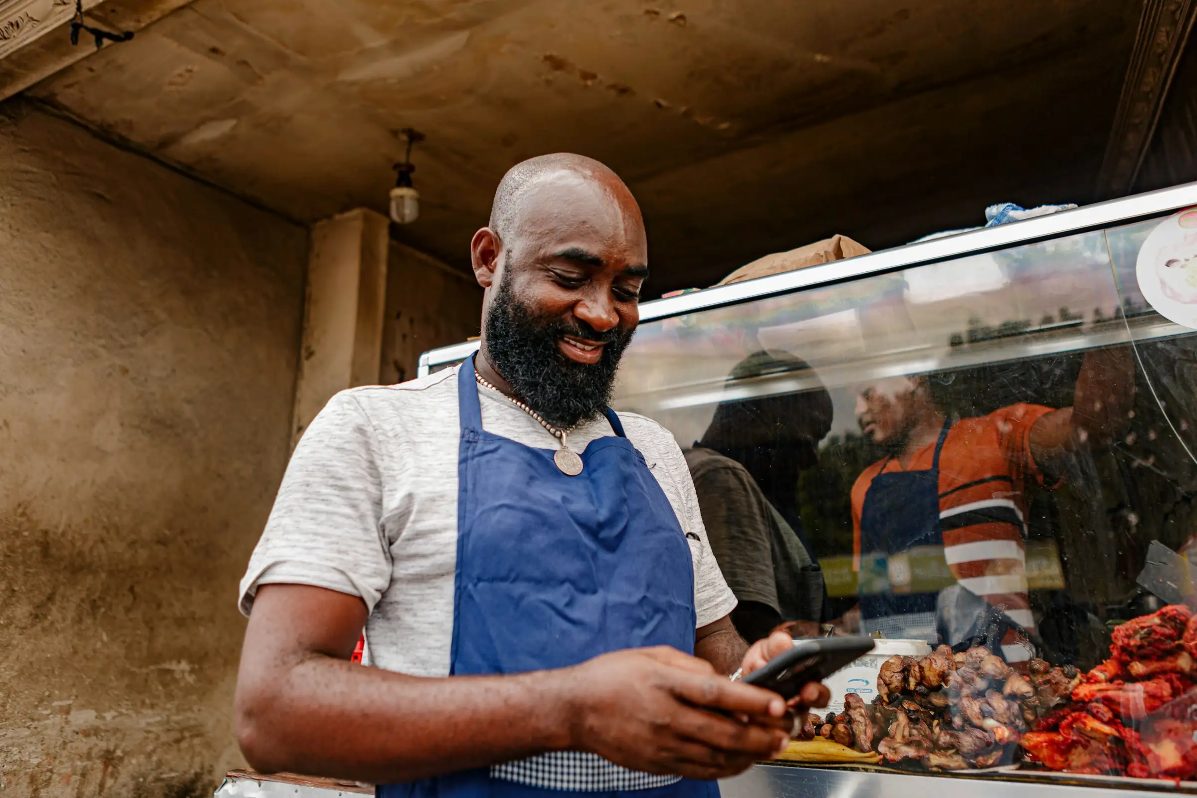 A market vendor, one of the people we lend to