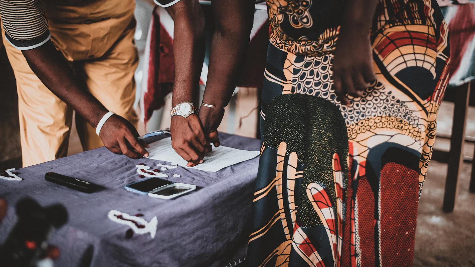 A customer and a loan officer talking through an application