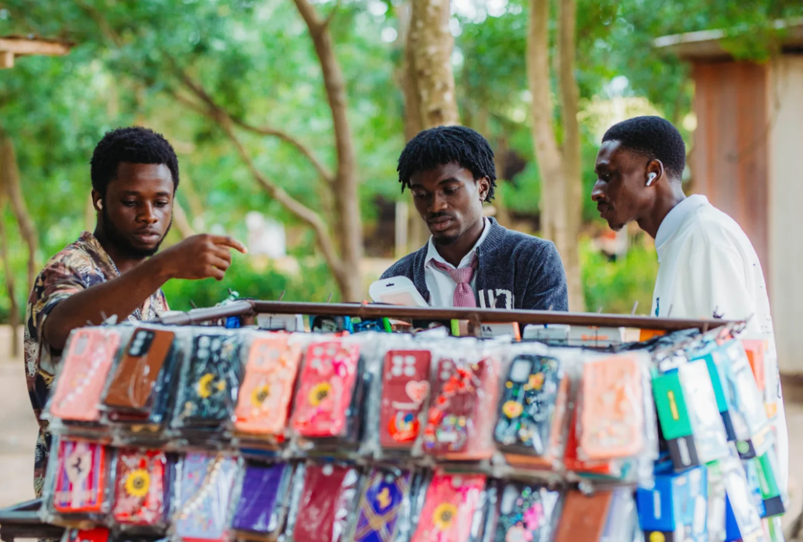 Young traders gathered at a phone-case stall